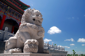 Stone male Lion and ball at Chinese Temple