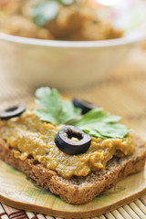 Squash caviar with olives, parsley and rye bread