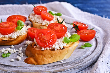 Sandwich with cheese, tomato and Basil