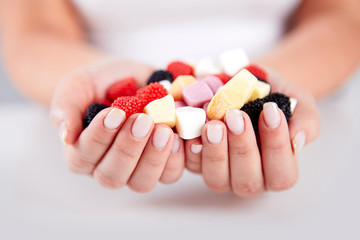 Woman hands holding candles