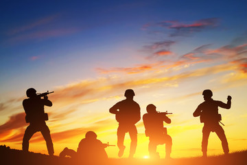 Soldiers in assault. War, army, military.