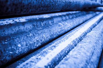 Steel rods or bars used to reinforce concrete