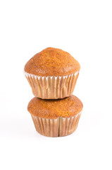 Two brown banana muffin in paper cupcake holder isolated on whit