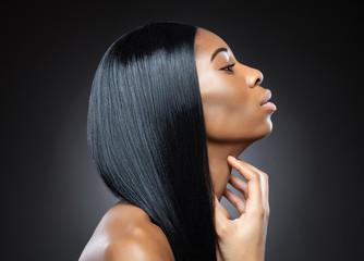 Profile of a black beauty with perfect straight hair