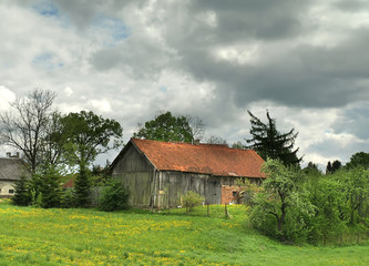 Obraz premium old barn in masurian village in Poland