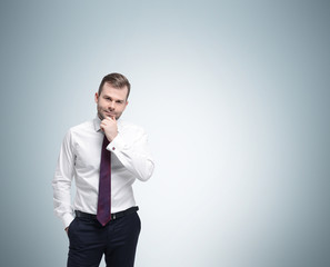 Young businessman in a formal clothes.