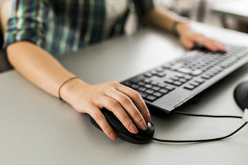 Close up of a woman using computer