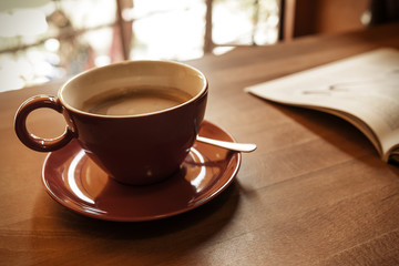 Cup of coffee and a magazine