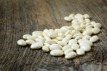 Beans isolated on a wooden texture