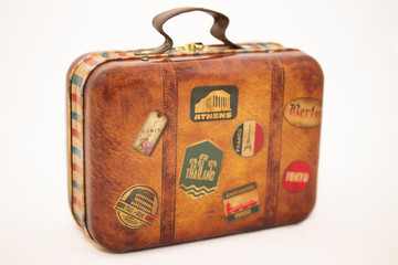Suitcase with labels of different countries