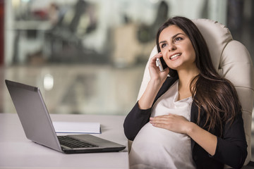 Pregnant businesswoman
