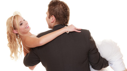 Wedding day. happy bride and groom on white