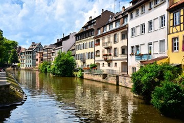 Fototapeta na wymiar Picturesque houses lining the canals of Strasbourg, France