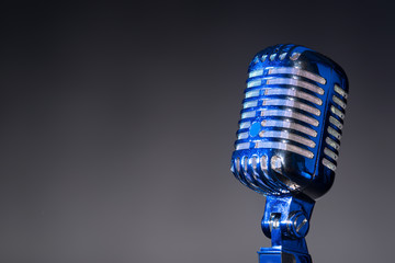 Old fashioned microphone with space for text