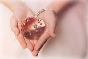 magic ball in his hands