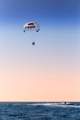 parasailing over blue sea