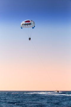 parasailing over blue sea