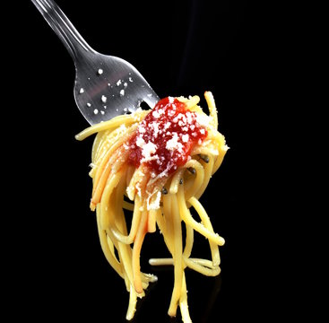 Studio shot of italian spaghetti pasta with tomato sauce