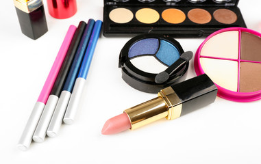 Different cosmetics isolated on white