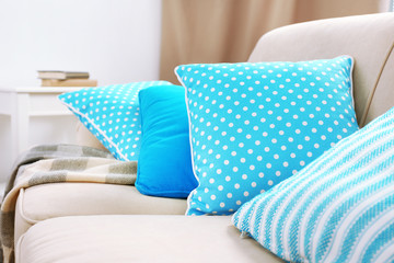 Interior design with pillows on sofa, closeup