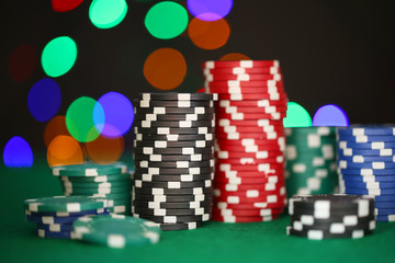 Chips for poker on shiny background