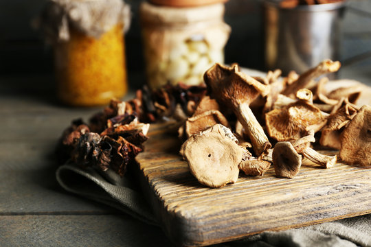 Dried mushrooms on cutting board, closeup