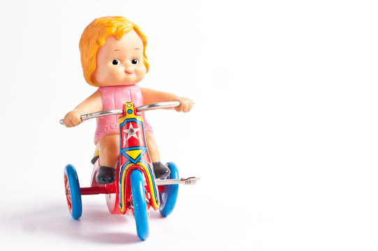 antique tin toy girl ride bicycle