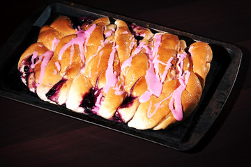 Strawberry danish pastry on a baking tray 