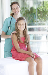 Pediatrician with her patient