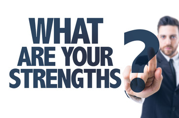 Business man pointing the text: What Are Your Strengths?