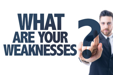 Business man pointing the text: What Are Your Weaknesses?