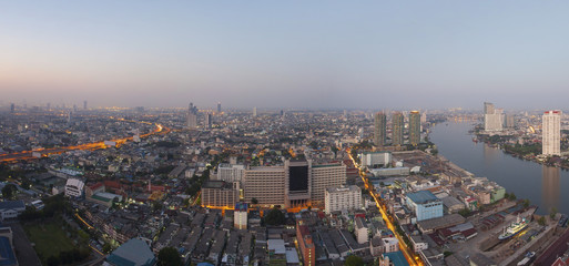 Fototapeta premium top view from high building roof morning light of bangkok capita