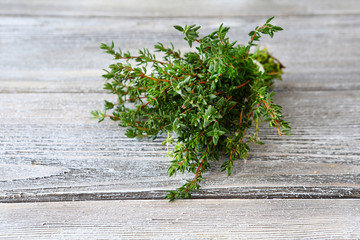 Bunch of thyme on wooden boards