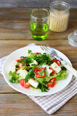 Fresh salad with vegetables on a plate