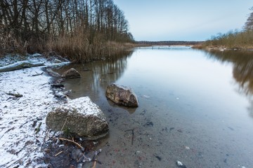 Fototapeta na wymiar Winter river in forest
