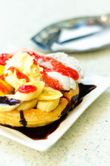 Breakfast - waffles with fresh berries and cream