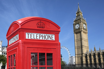 London red telephone box booth with westminster houses of parliament building and Big Ben clock...