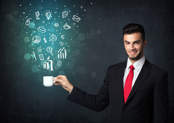 Businessman holding a white cup with business icons
