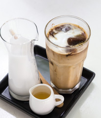 Iced coffee cubes with milk and sirup