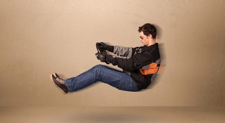 Happy funny man driving a flying car concept