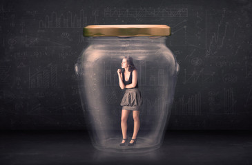 Businesswoman shut inside a glass jar concept