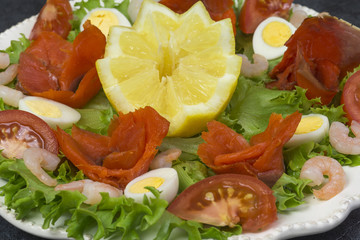 Sockeye salmon on salad leaves