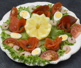 Sockeye salmon on salad leaves