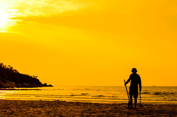 Fototapeta na wymiar Electronic beach combing, Hua Hin Thailand with sun rise.