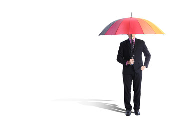 Businessman holding rainbow umbrella