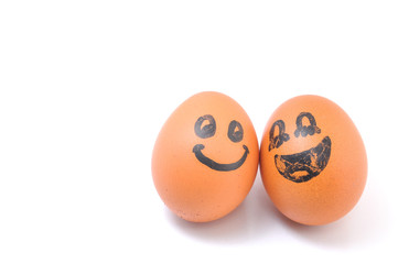 Funny smile, love and happy  egg on white background.