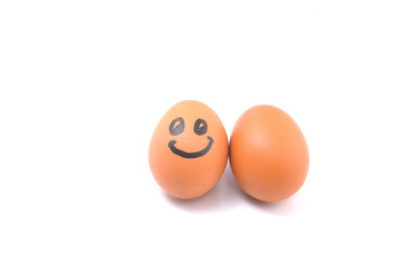 Funny smile egg with plain egg on white background.