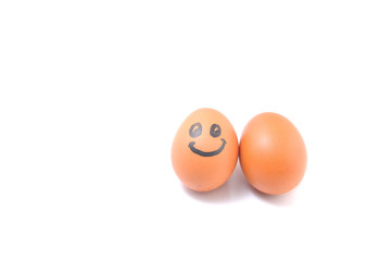 Funny smile egg with plain egg on white background.