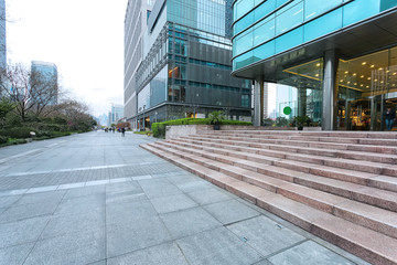 Fototapeta premium Empty road near modern building exterior