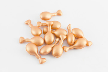 Hair vitamin oil serum capsule beauty care isolated on white bac